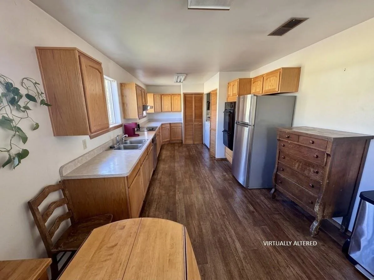 Kitchen at 1266 N Davis Ave., Weed — 1 of 3